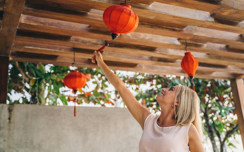 Person smiling and looking at the bright horizon